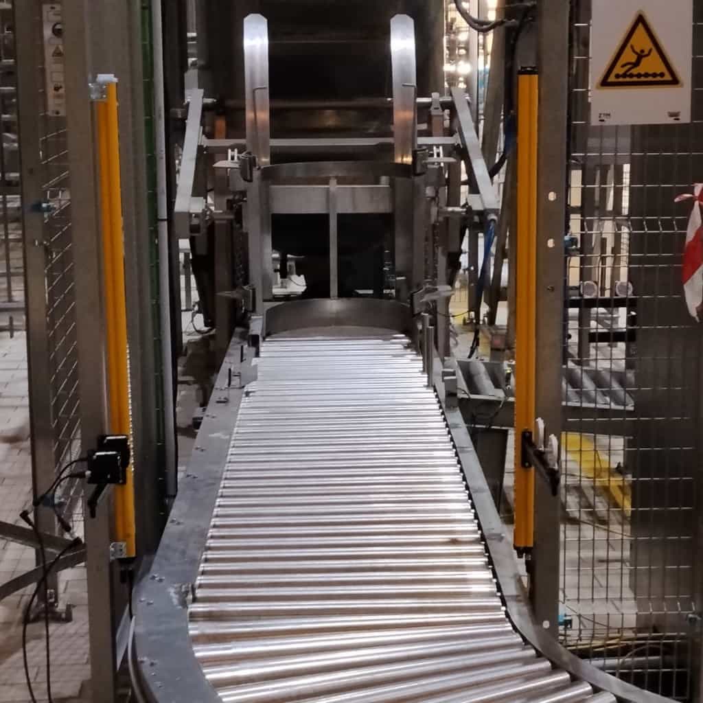 Barreras fotoeléctricas instaladas en transportador de rodillos